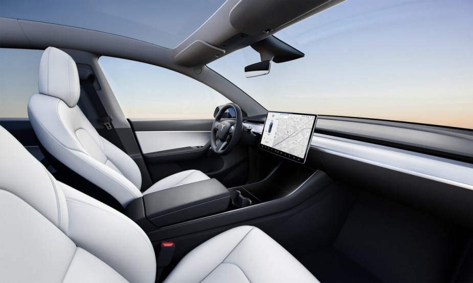 Dashboard in new 2023 Tesla Model Y crossover SUV EV, highlighting how much fully loaded version costs 