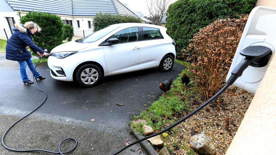 A Renault electric car charging at home using a Level 1 standard outlet