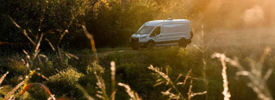 A 2023 Ford Transit Trail shows its rugged styling as a camper van.