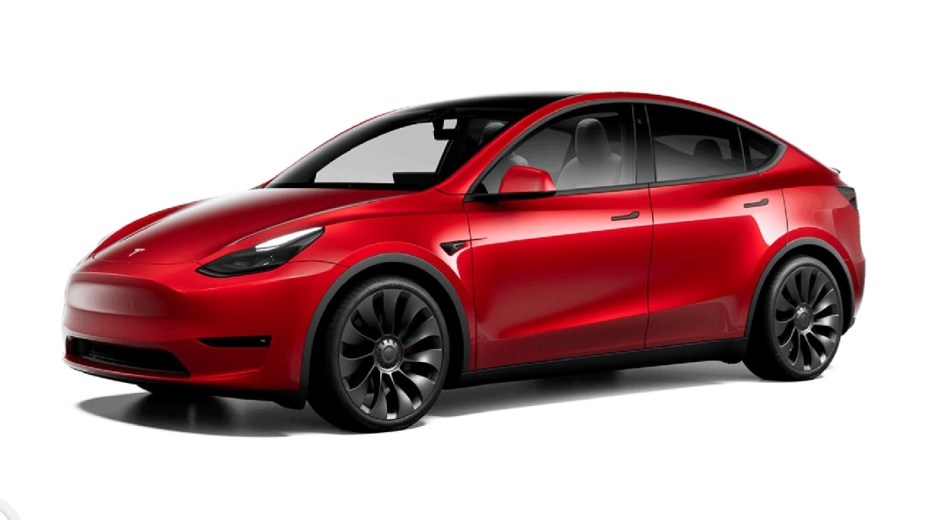 Front angle view of red 2023 Tesla Model Y electric crossover SUV