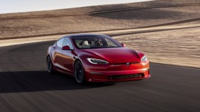 Front angle view of red 2023 Tesla Model S, only Tesla electric car with driving range over 400 miles