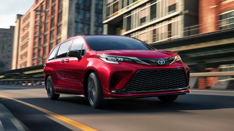 Front angle view of red 2023 Toyota Sienna minivan