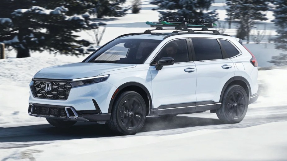 Front angle view of white 2023 Honda CR-V crossover SUV
