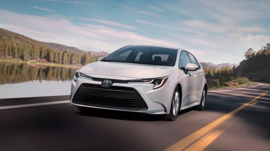 Front angle view of white 2023 Toyota Corolla compact car