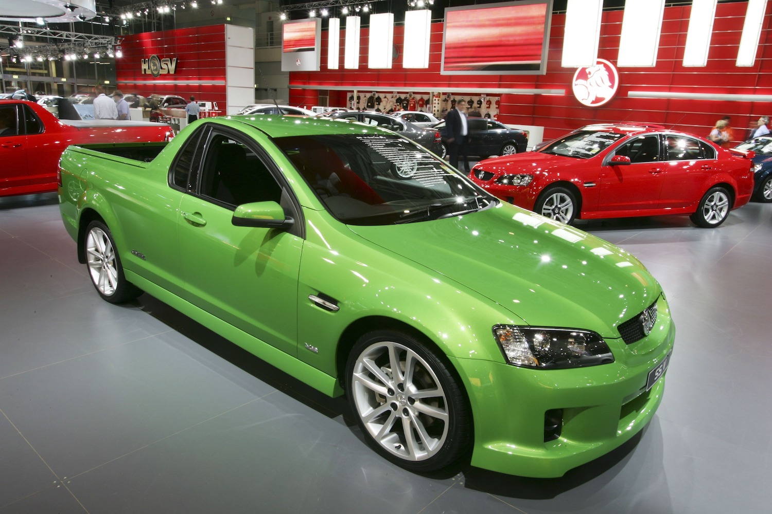 Bright green special edition of Holden's Ute compact coupe utility van parked at the Australian motor show.