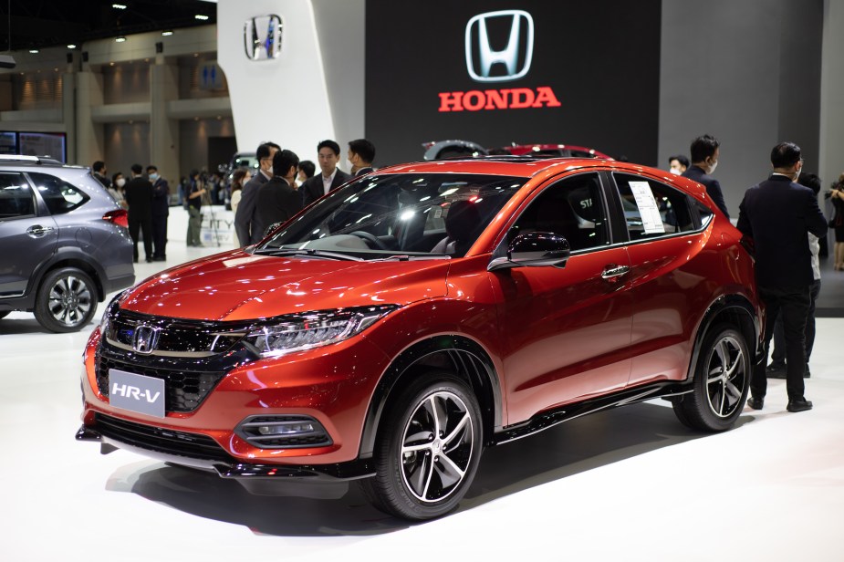 A red Honda HR-V, which is one of the most reliable crossovers. 