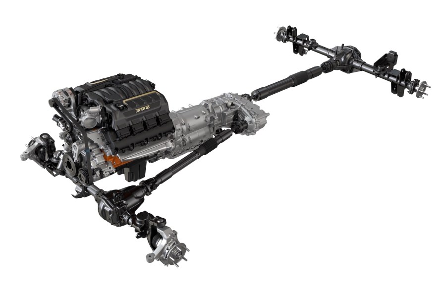 The isolated Dodge/Ram engine and drivetrain of the HEMI V8-powered Jeep Wrangler 392, set against a white backdrop.
