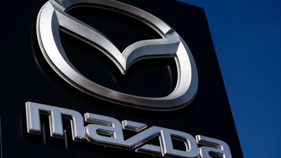 The Mazda logo pictured on outdoor advertising in Dortmund, Germany