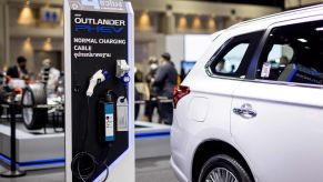 The charging cable of a Mitsubishi Outlander PHEV at the Thailand International Motor Expo 2021