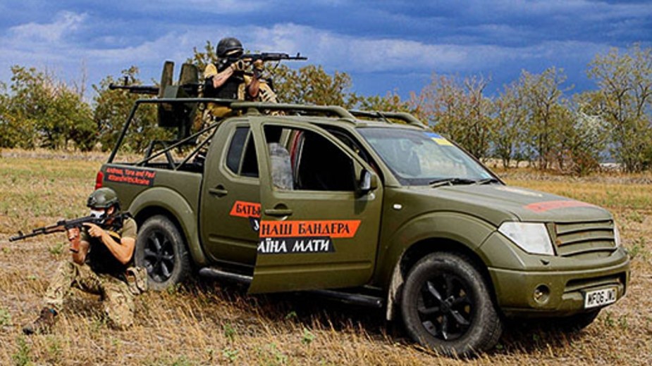 Old British farm pickup truck retrofitted for Ukrainian military, highlighting how it fools Russian snipers