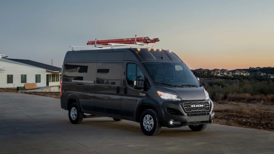 A New Ram ProMaster cargo van with a ladder on top.