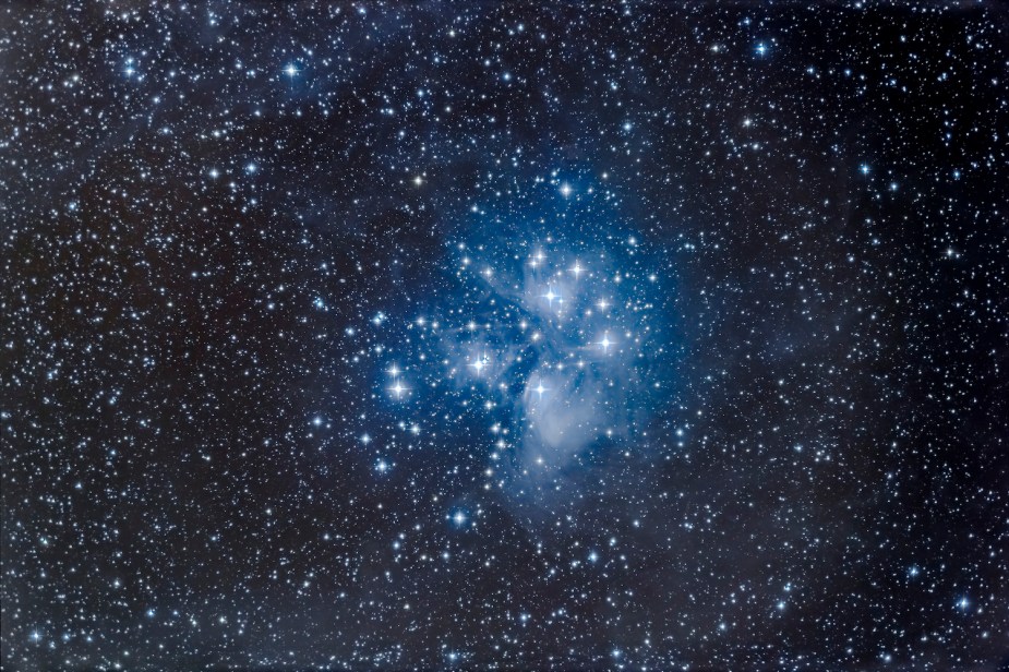 Telescope photo of the M45 constellation which  has the name Seven Sisters in the West, the Pleiades in Ancient Greek, and Subaru in Japan.
