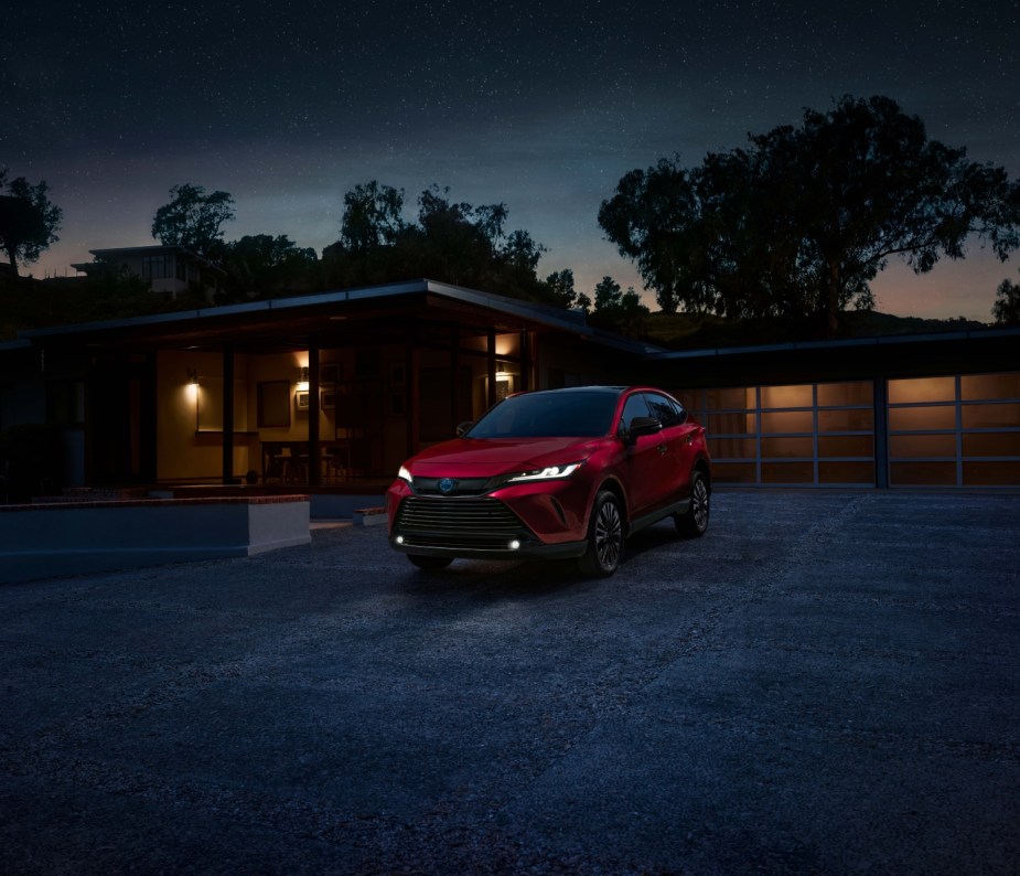 Comfortable and reliable SUVs under $45,000 like the Toyota Venza, one of the best midsize SUVs for 2023, pictured here in red.