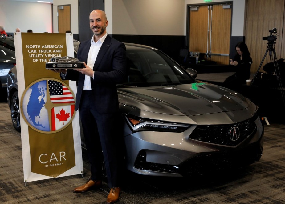 Emile Korkor, assistant vice president of Acura National Sales accepts the award for the 2023 Acura Integra that won the 2023 North American Car of the Year award.