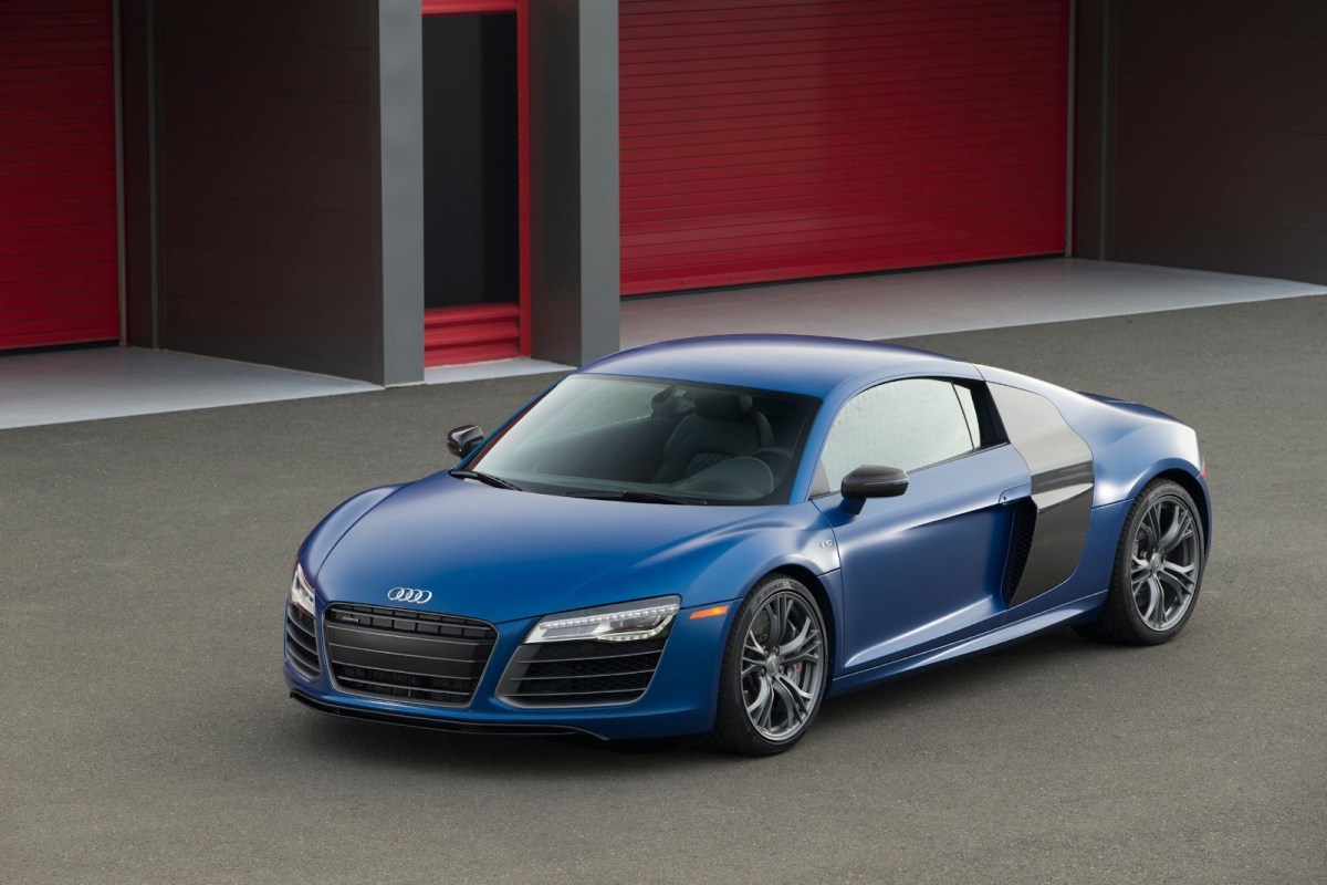 A blue first-generation Audi R8 shot from above