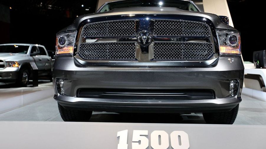 A 2013 Ram 1500 on display at an auto show.