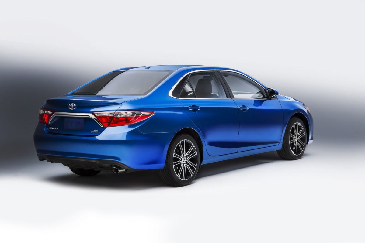 A blue 2016 Toyota Camry on display.