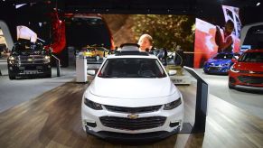 A 2017 Chevy Malibu on display at an auto show.