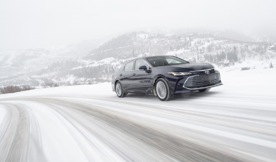 The 2021 Toyota Avalon, unlike the 2022 Toyota Avalon, offers AWD for snowy surfaces. 