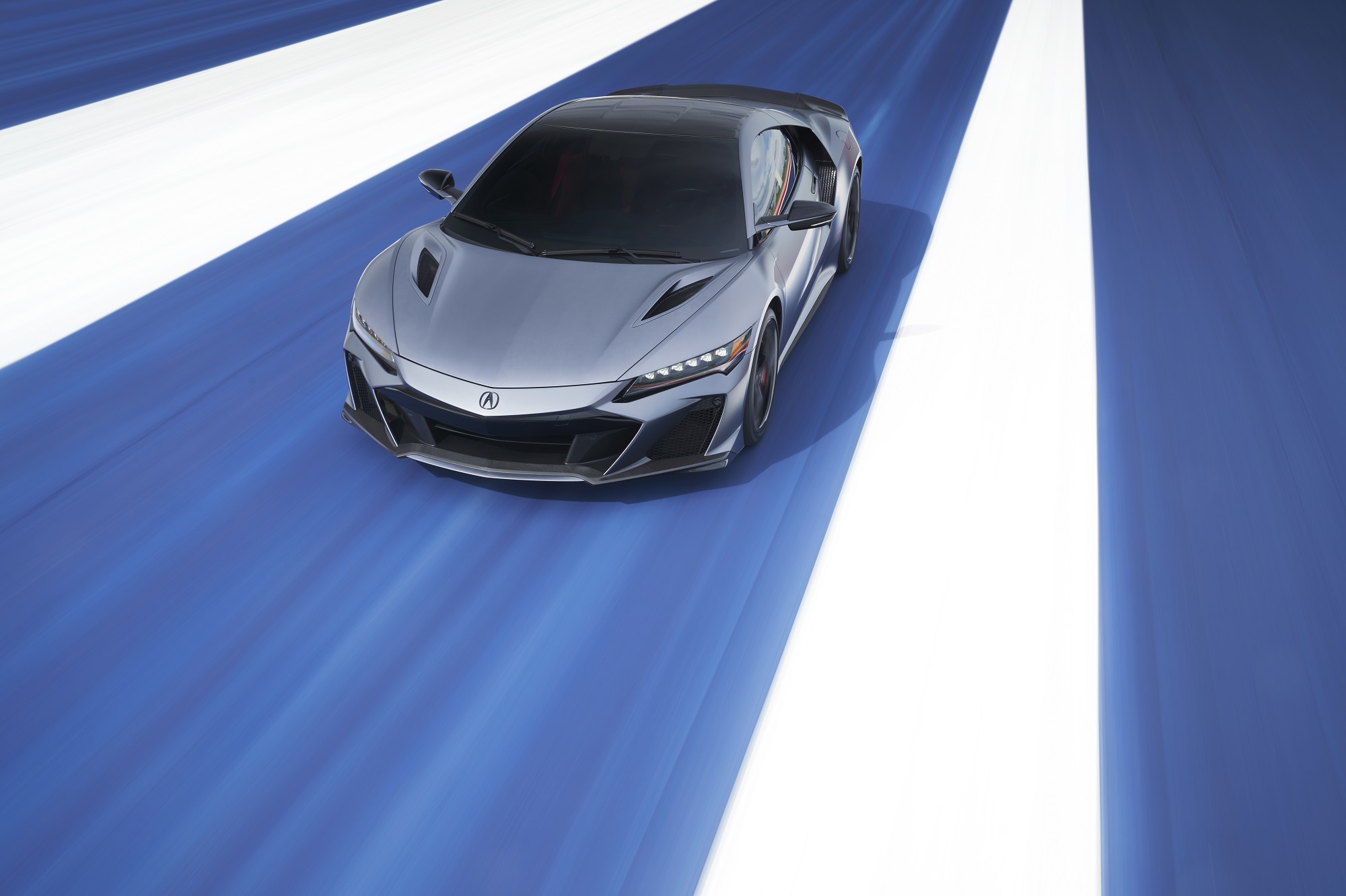 A 2022 Acura NSX Type S blasts down a track.