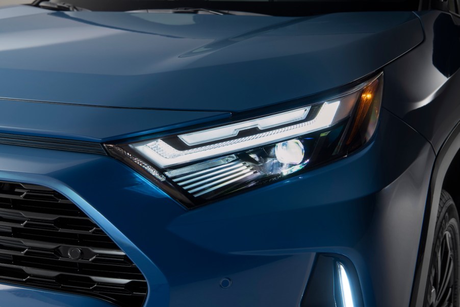 A blue 2022 Toyota RAV4 which is a Toyota with the lowest insurance cost with a recent accident.