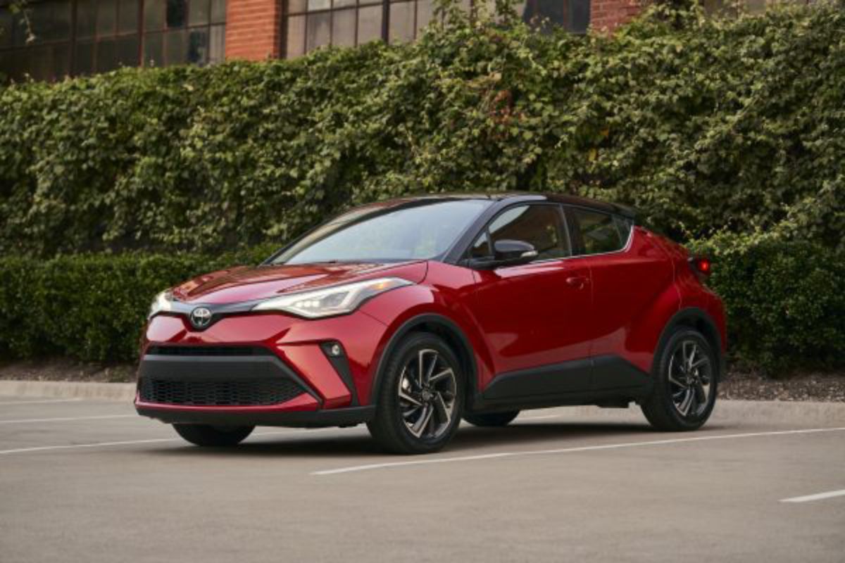 A red Toyota C-HR in the parking lot.