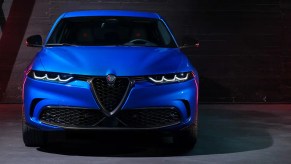 A blue 2024 Alfa Romeo Tonale luxury crossover with a reasonable starting price
