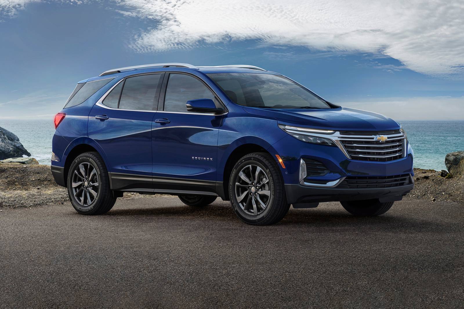 A blue 2023 Chevy Equinox parked on the pavement