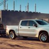 2023 Chevy Silverado 1500 Towing a trailer at a job site