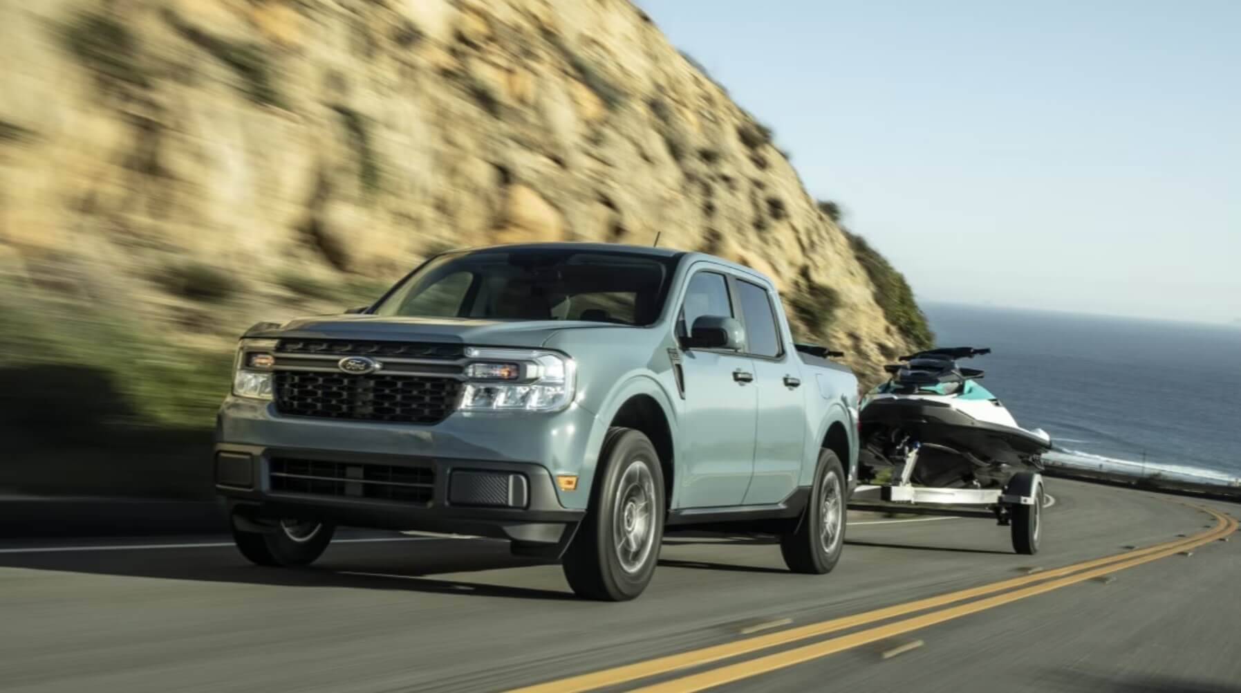 The 2023 Ford Maverick Hybrid towing a small trailer