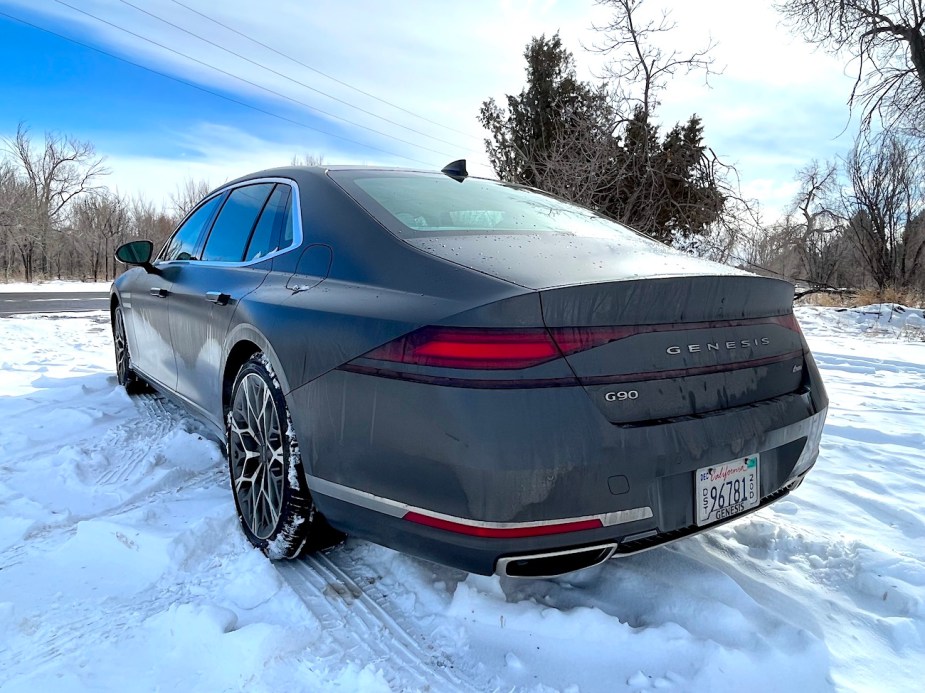 2023 Genesis G90 rear view of the car in the snow
