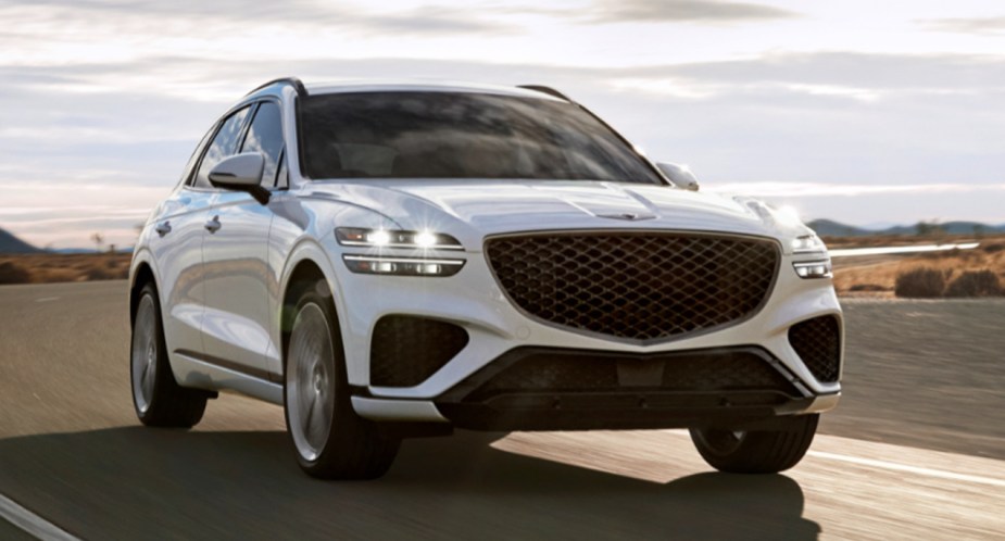 A white 2023 Genesis GV70 small luxury SUV is on its way.