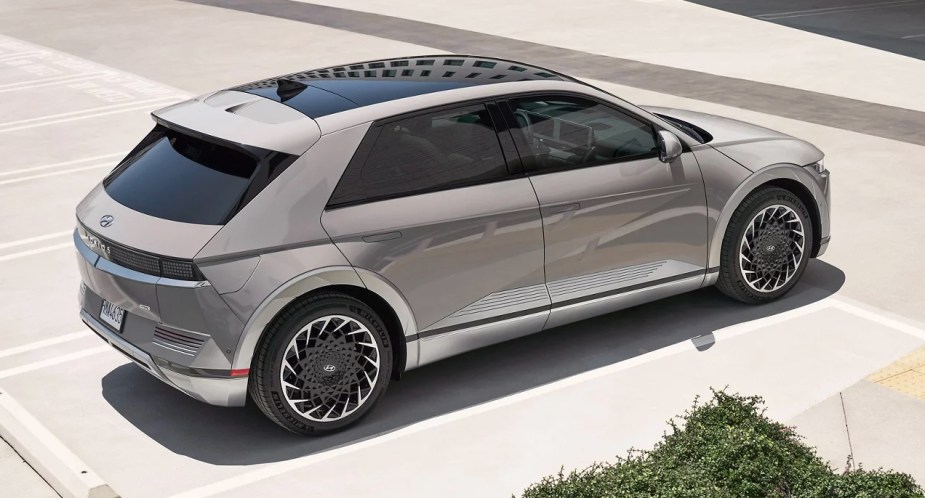A gray 2023 Hyundai Ioniq 5 small electric SUV is parked.