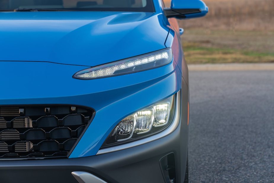 A blue Hyundai Kona, which is one of the cheapest SUVs.