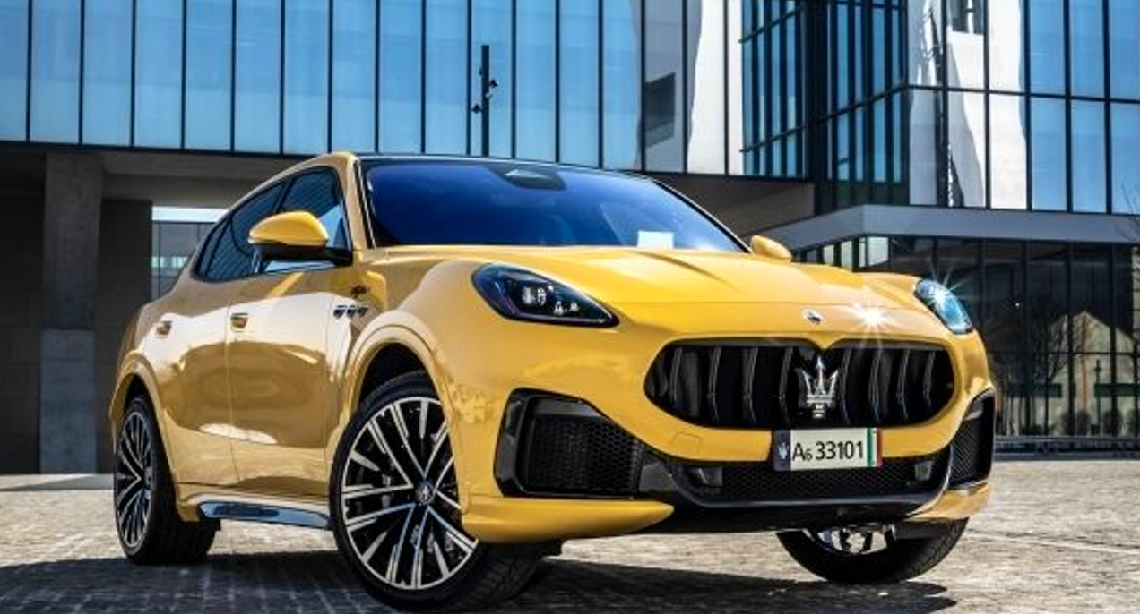 A yellow 2023 Maserati Grecale small luxury SUV is parked.