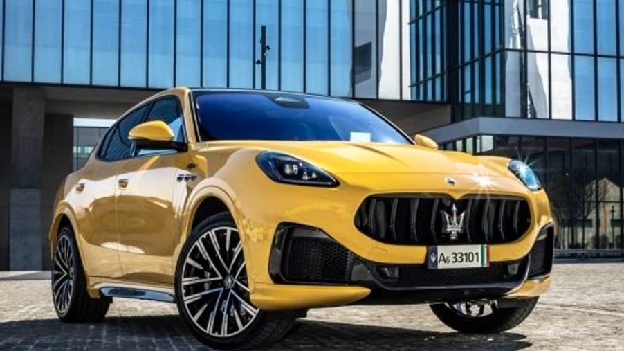 A yellow 2023 Maserati Grecale small luxury SUV is parked.