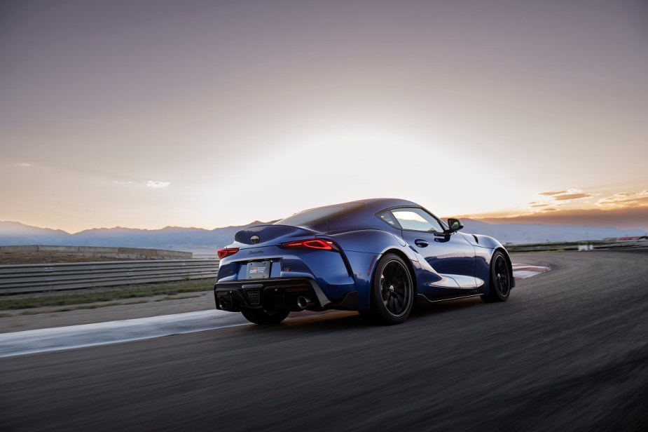 2023 Toyota GR Supra blue, rolling on the track