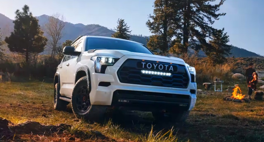 A white 2023 Toyota Sequoia full-size SUV is parked outdoors.