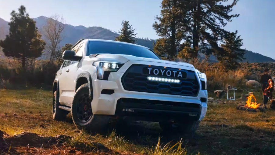 A white 2023 Toyota Sequoia full-size SUV is parked outdoors.