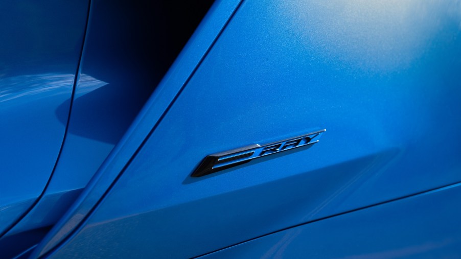The new 2024 Chevrolet Corvette E-Ray shows off its new blue paint work and badge.