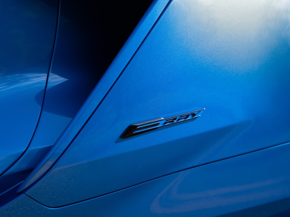 The new hybrid electric Corvette E-Ray shows off its badge, which indicates that it has an electric motor. 