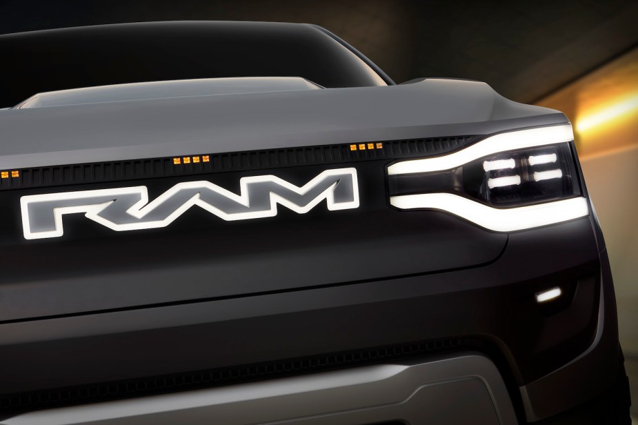 Closeup of the RAM letters on the grille of the Revolution concept pickup truck.