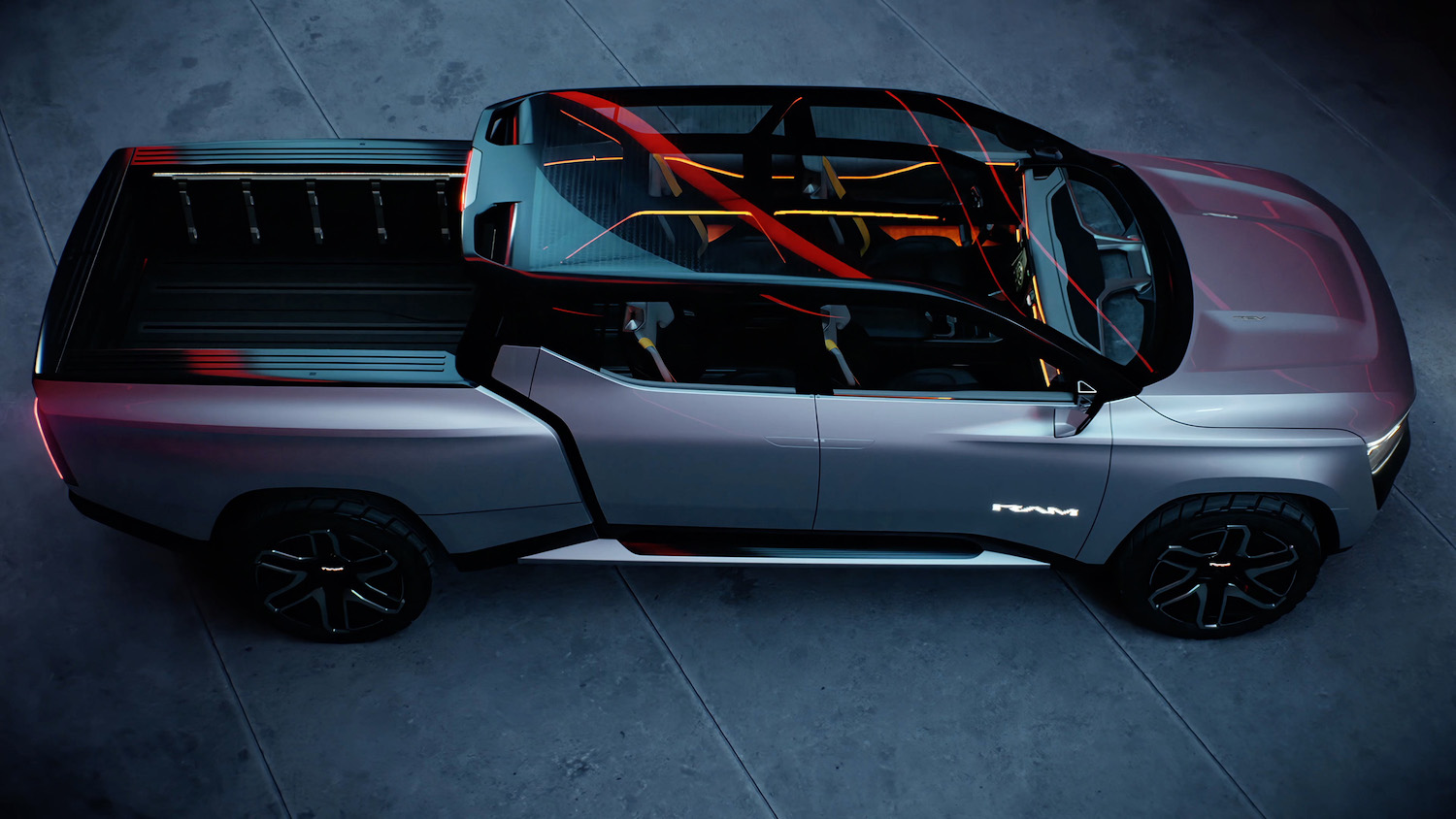 Birds-eye view of the Ram 1500 Revolution electric pickup concept with its glass roof and full-size truck bed.