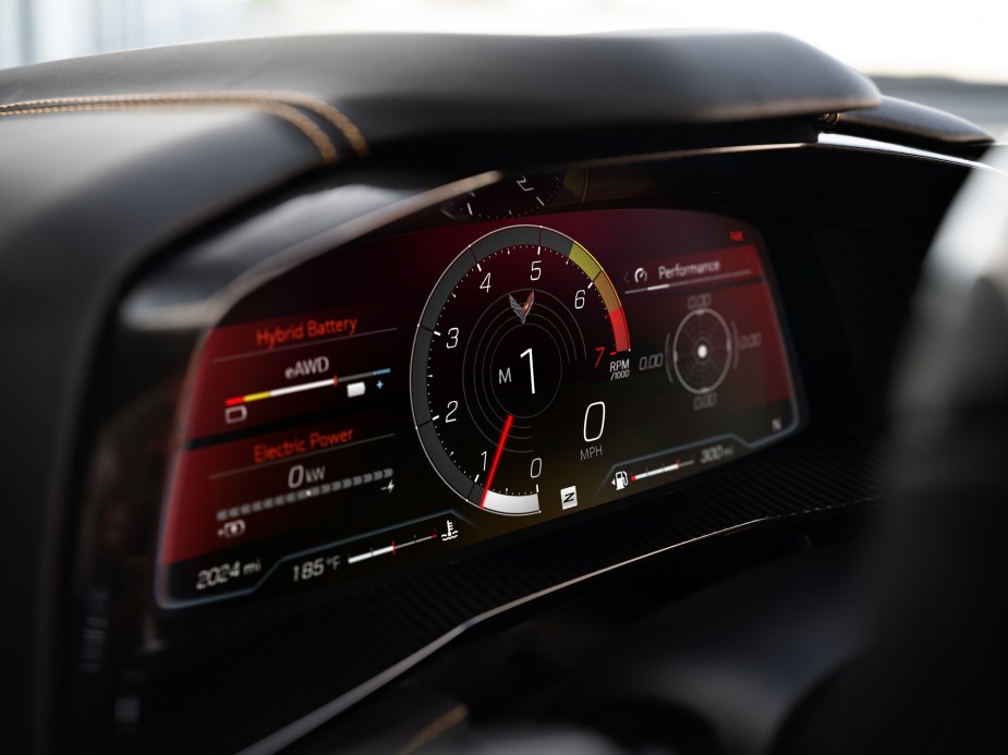 The 2024 Chevrolet Corvette E-Ray interior shows a digital display with access to driver modes.