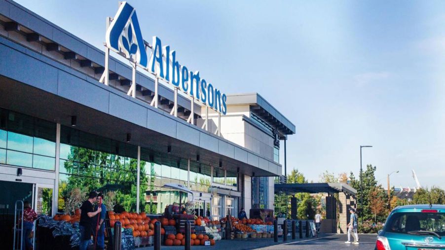 An Albertsons supermarket entrance and parking lot, found on Broadway Avenue in Boise, Idaho