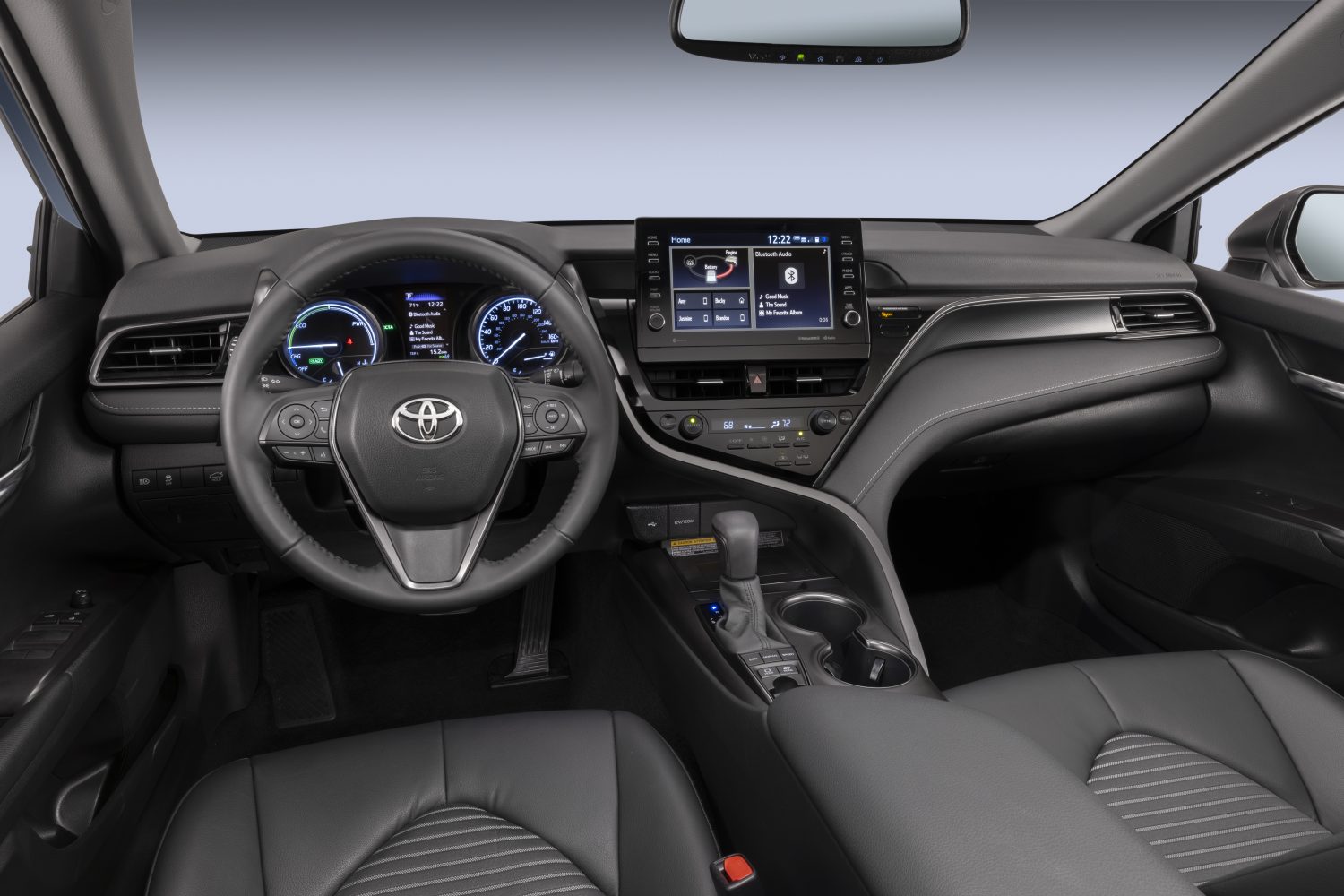 Interior of the 2023 Toyota Camry with steering wheel and infotainment center in view