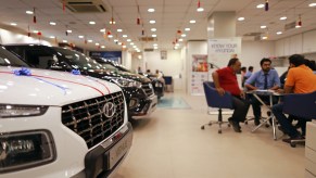 A dealership where SUV prices go down potentially while buying a car.