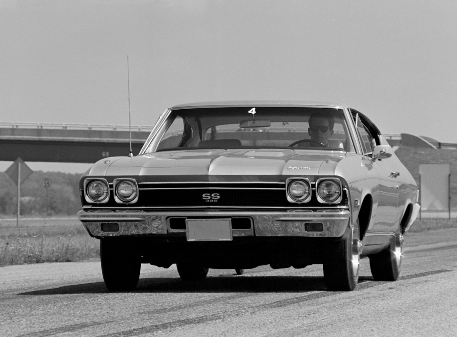 A then-new Chevelle SS cruises a test track. 