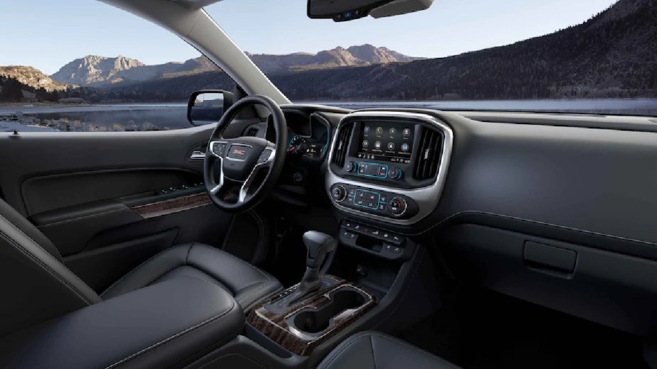 Dashboard and front seats in 2022 GMC Canyon pickup truck, the most affordable new GMC car