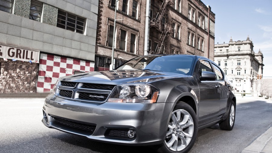 A silver Dodge Avenger, which is one of the top Dodge models.